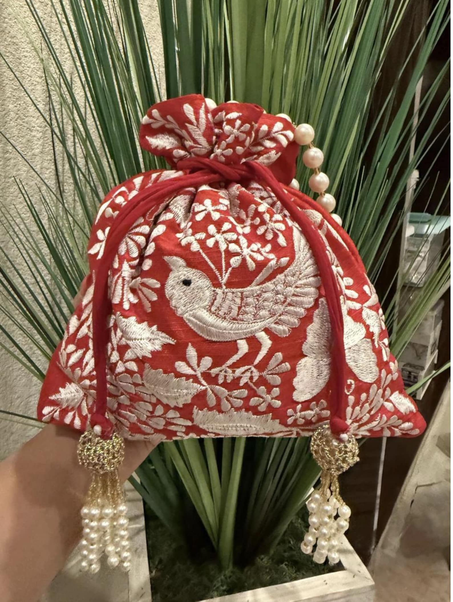 Handwoven Bird Red and Blue Potli Bags with Pearl Handles thumbnail 4